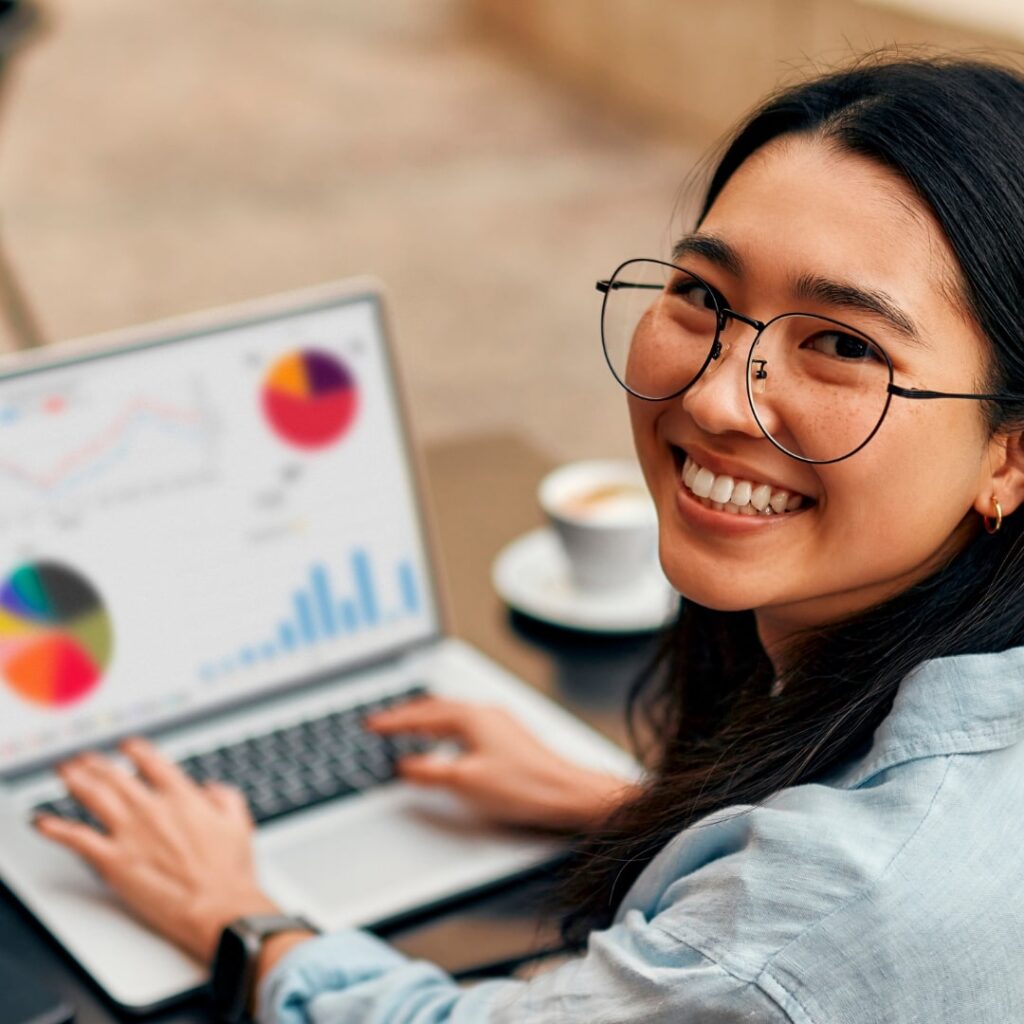 Dental SEO experts reviewing analytics and SEO performance metrics on a laptop.