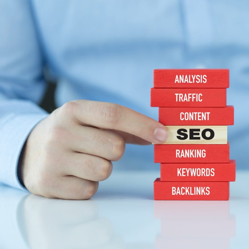 UX in Dental SEO Marketing concept using building blocks labeled with SEO elements.