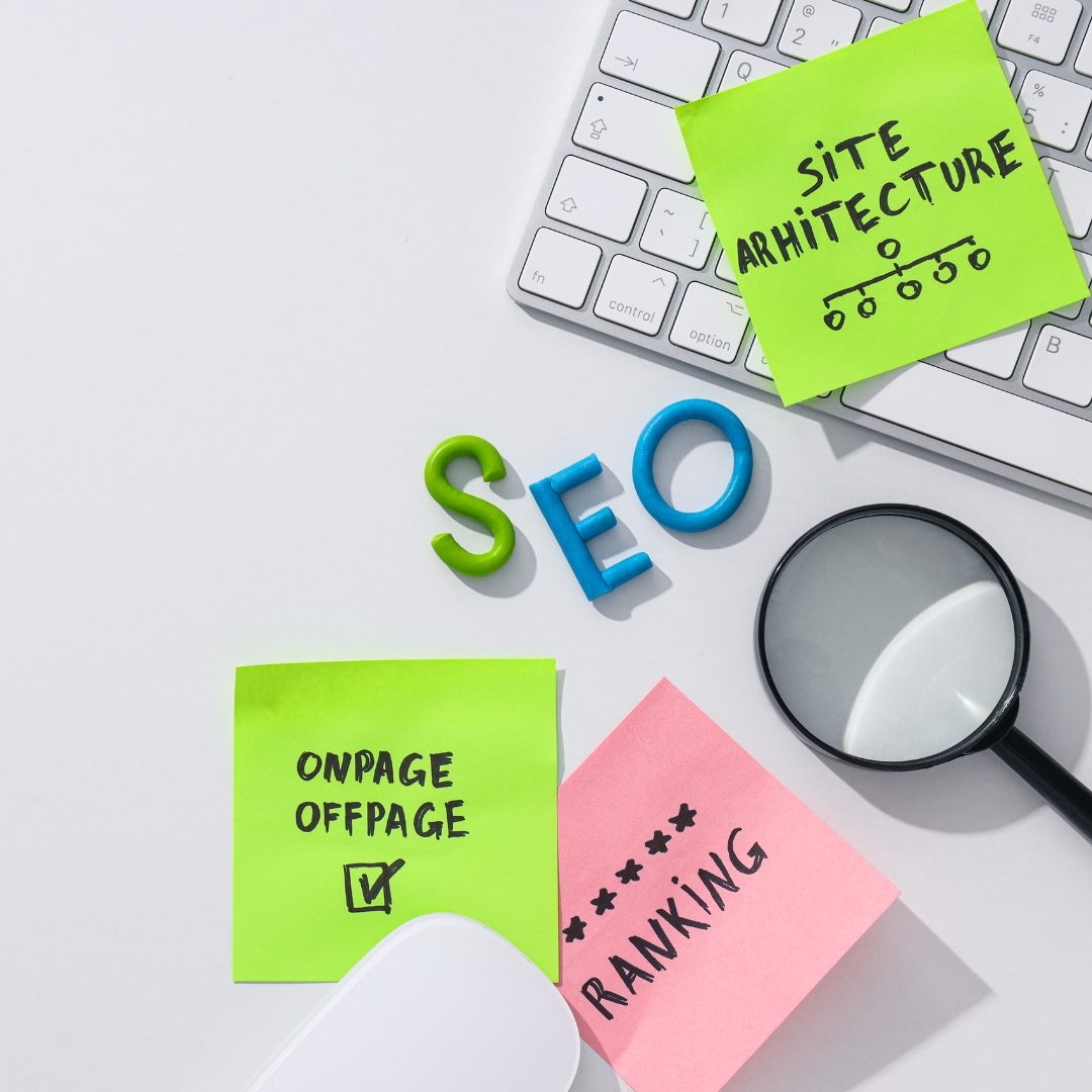 Sticky notes on a desk with SEO terms, symbolizing optimization through Google Business Profile for NGOs.