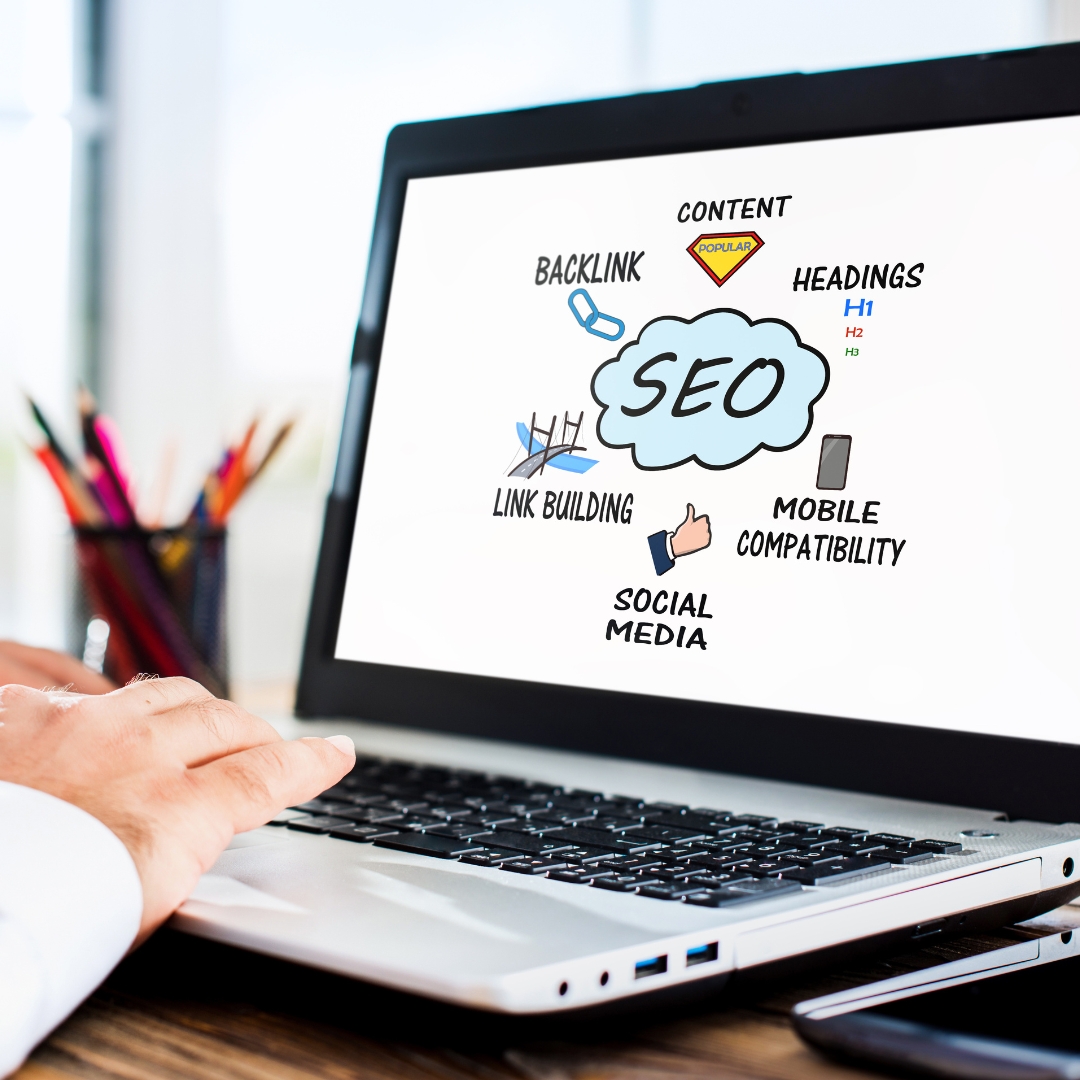 Laptop screen showing SEO elements like backlinks, mobile compatibility, and content, linked to Mobile SEO for Nonprofits.