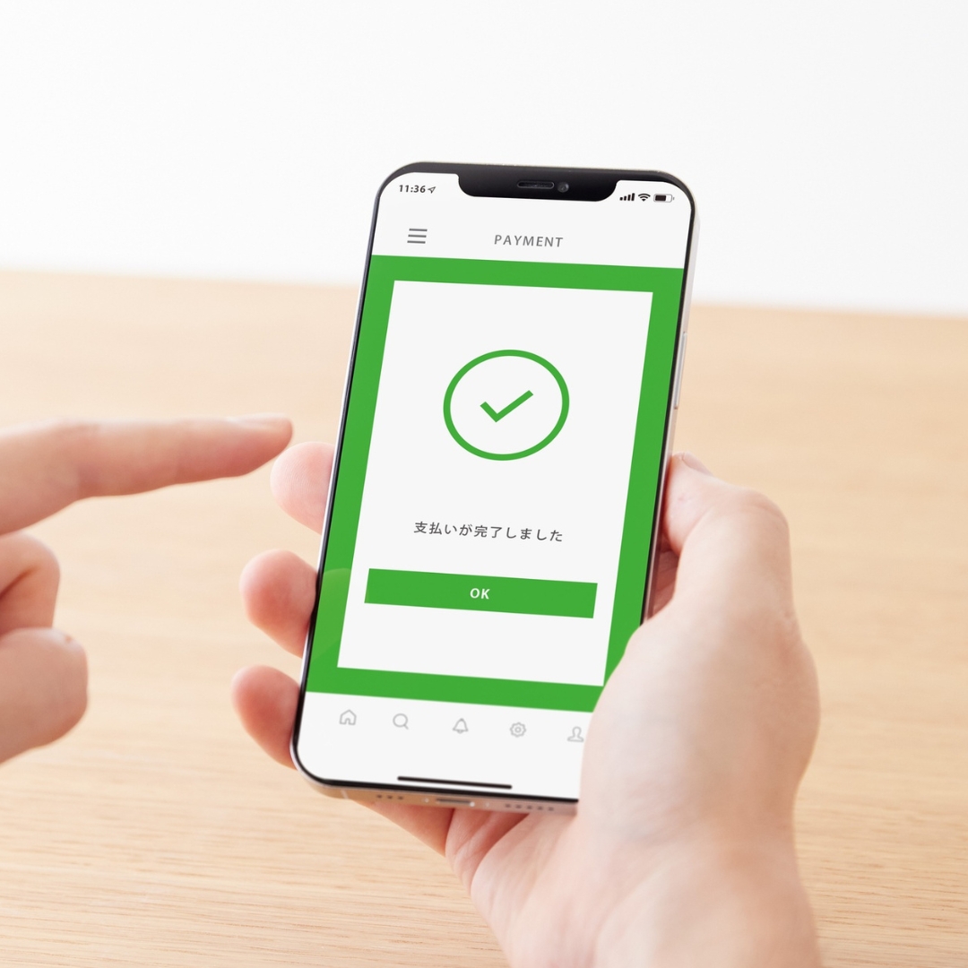 Mobile payment confirmation screen showing user interaction, reflecting user experience in Mobile SEO for Nonprofits.